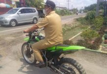 Kades Hessa Air Genting berikan contoh tidak baik, Naik Kendaraan Dinas tanpa plat merah dan helm