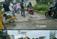 Masyarakat Di Panjaitan Perbaiki Jalan Berlobang Dengan Swadaya, Minta KAI Pasang Palang Pintu Kereta Api