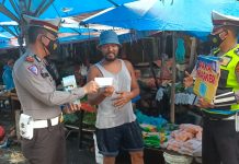 Cegah Penyebaran Covid-19, Sat Lantas Polres Tanjungbalai kembali berikan masker gratis dan himbauan para pengguna jalan