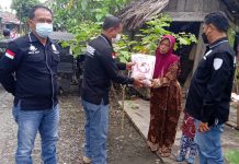 Sat Reskrim Polres Tanjung Balai Gelar Bansos Peduli Kasih Kepada Warga Terdampak Covid-19