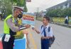 Pembagian Masker Secara Gratis, Pada Siswa dan Himbau para penguna jalan agar Terbiasa Memakai Masker