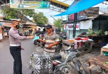 Sat Lantas Polres Tanjung Balai Lanjutkan Pemberian Masker Gratis kepada Warga