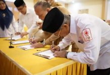 Plt Wali Kota Tanjungbalai Hadiri Penandatanganan MOU dan Sosialisasi Guru Pembina PMR Se Kota Tanjungbalai