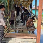 KAPOLSEK TELUK NIBUNG PIMPIN DAN AWASI RENOVASI JEMBATAN MERAH PUTIH